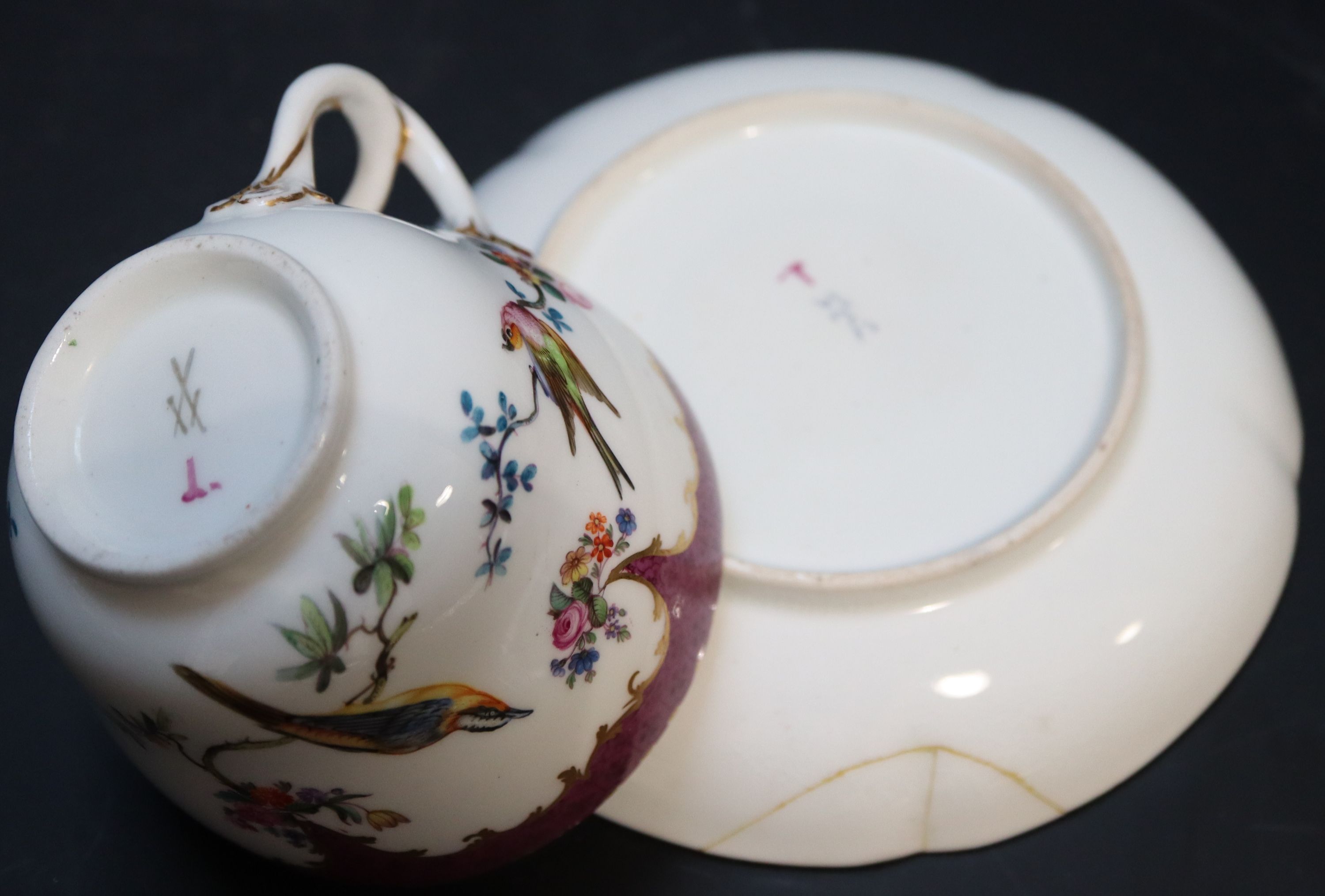 Five Continental porcelain cups and saucers, 19th century,